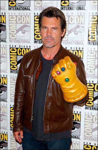 Thanos (Josh Brolin) isn't smiling as he shows off the Infinity Gauntlet 